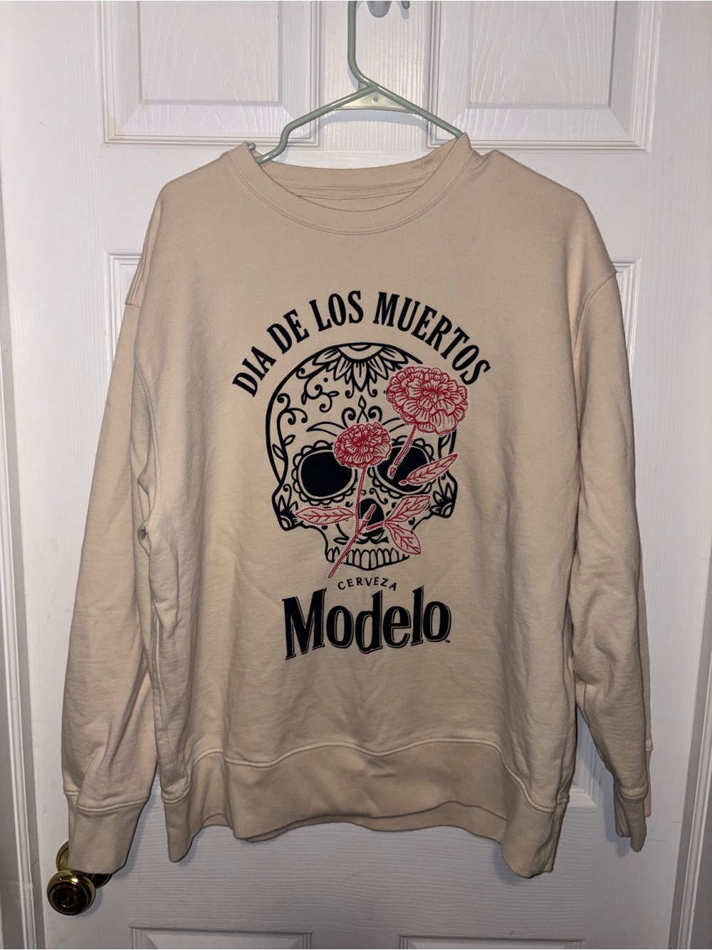 Lucky Brand Cream Crewneck Sweatshirt with Black and Red Skull Graphic